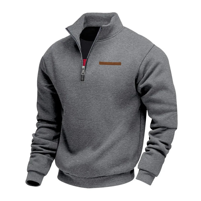 Model from behind wearing a men's navy fleece pullover sweatshirt, showing fit