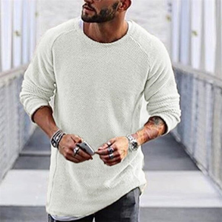 Warm men's long sleeve crewneck pullover sweater in a cozy knit. Ideal casual wear for fall and winter seasons.