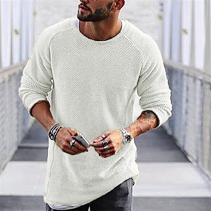 Warm men's long sleeve crewneck pullover sweater in a cozy knit. Ideal casual wear for fall and winter seasons.