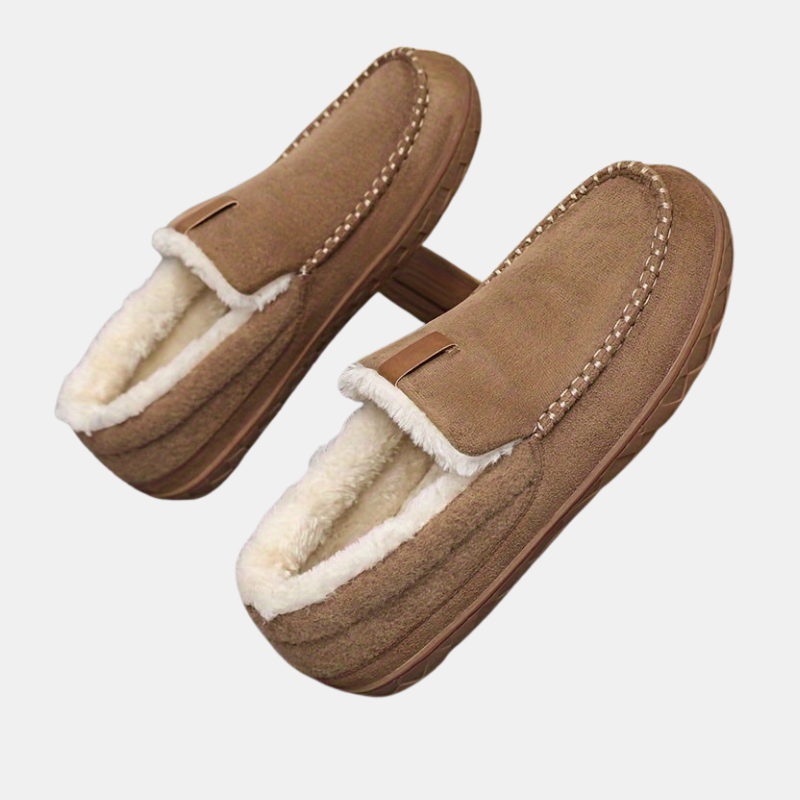 Men's cozy sheepskin-lined slippers with non-slip sole for indoor comfort and warmth.