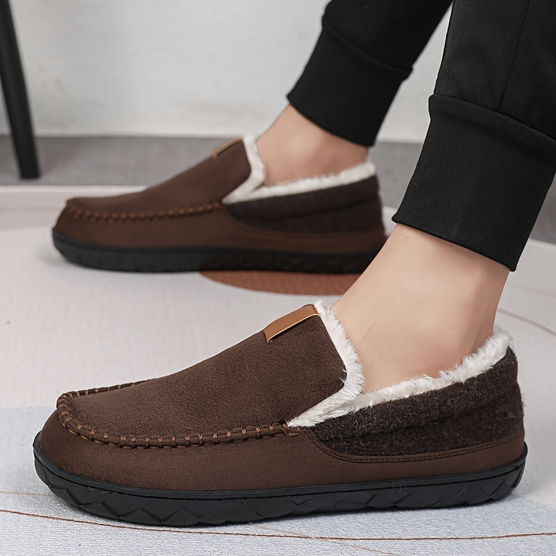 Cozy men's house shoes with a plush sheepskin interior and non-slip rubber sole.