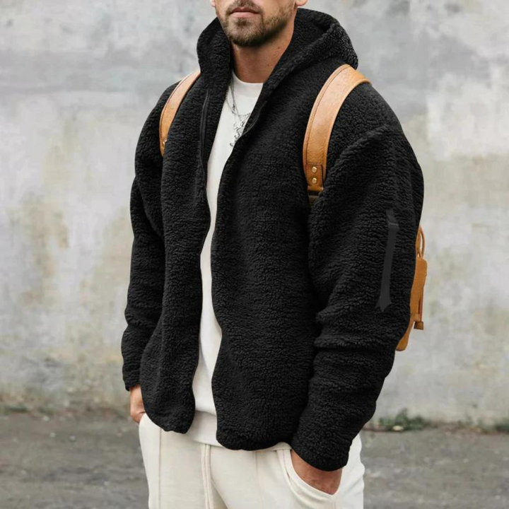 Stylish men's cozy hooded winter jacket, a warm zip-up outer layer for relaxed fit and fall fashion.