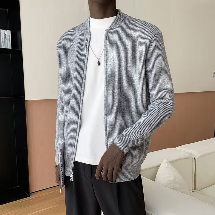 Full length shot of a man in a cozy ribbed zip-up sweater, perfect for versatile fall & winter stylish layering.