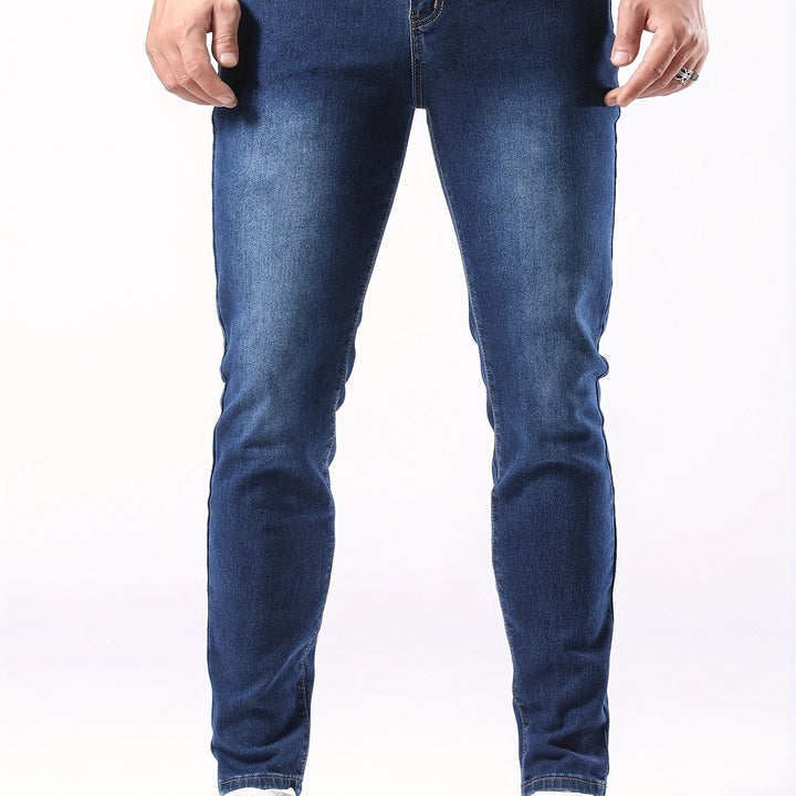 Comfortable men's stretch denim jeans, slim fit in a classic deep blue, perfect for daily wear.