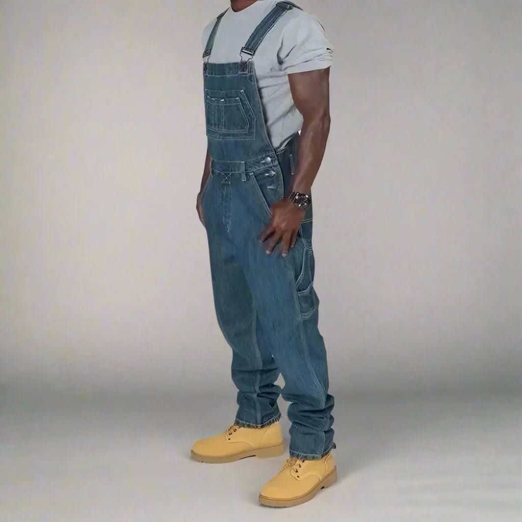 Front view of a men's denim overall, comfortable straight leg design with practical chest and side utility pockets.