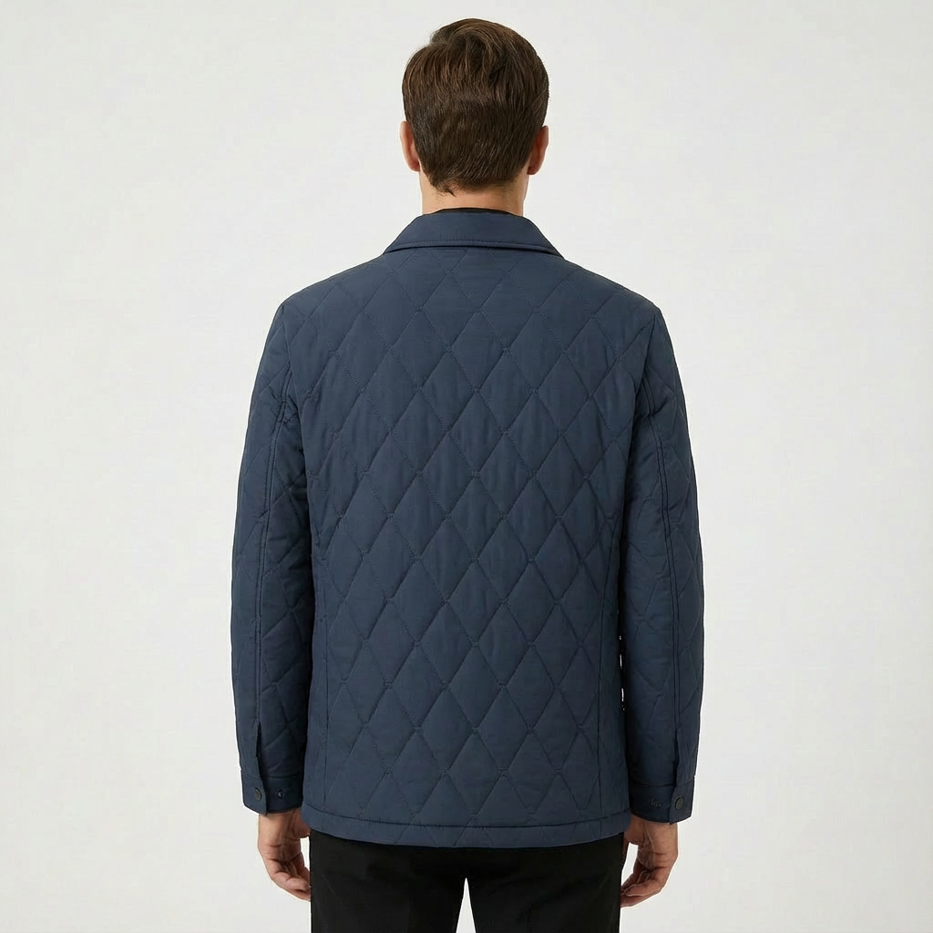 Men's versatile outerwear jacket with functional utility pockets & comfortable quilted finish. Ideal for layering.