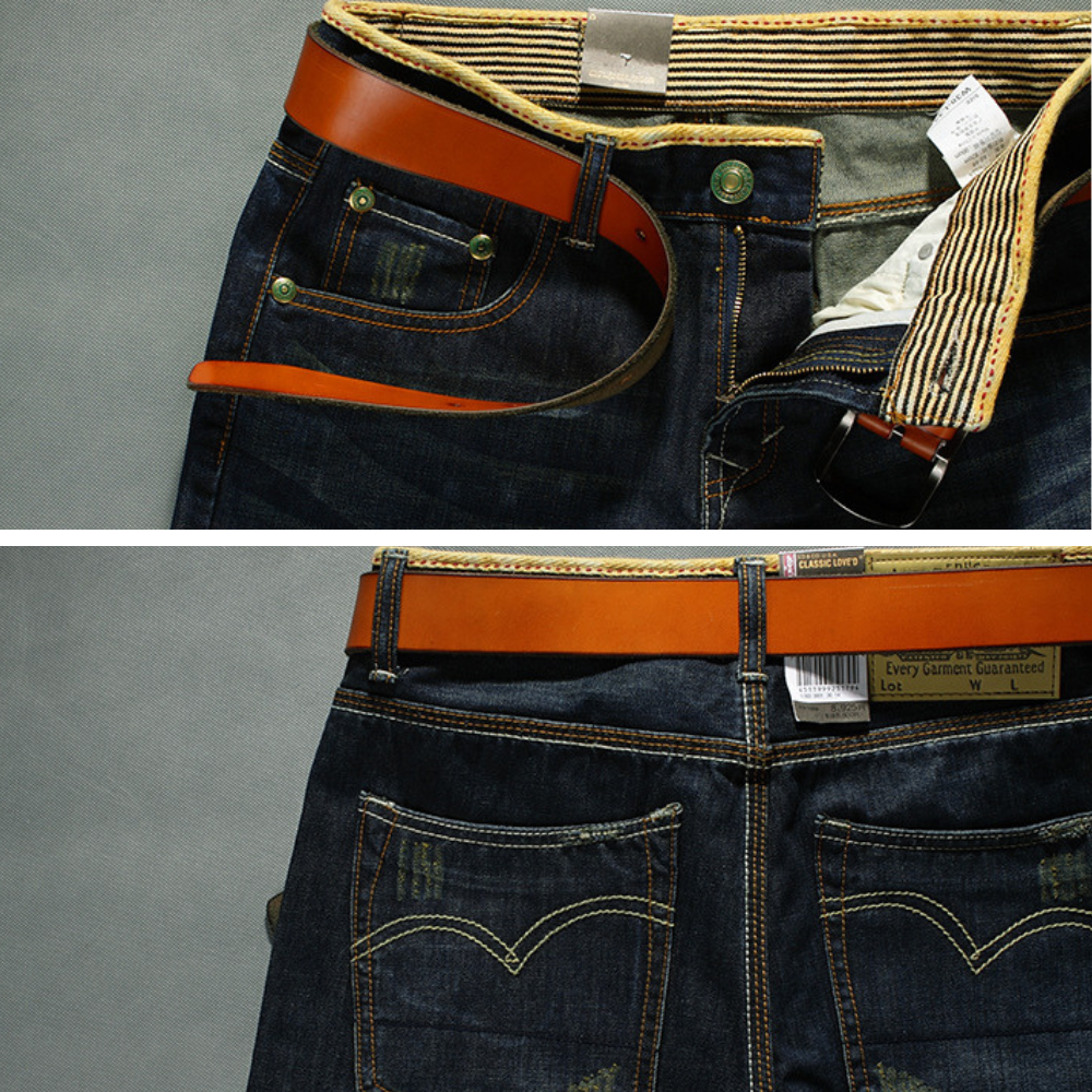 Rugged distressed denim men's shorts with rips, ideal for a stylish, casual summer streetwear look.