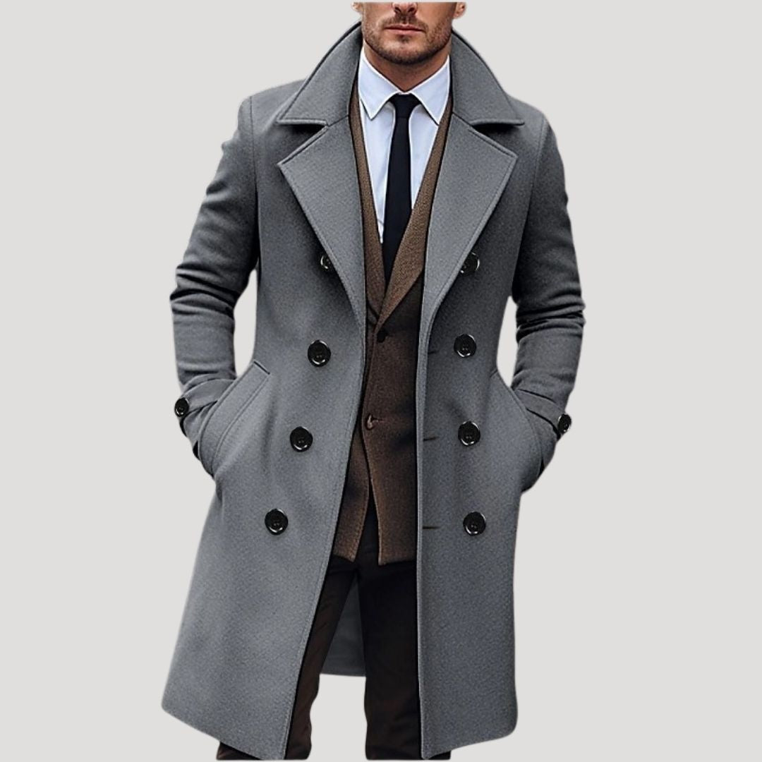 Fashionable men's spring trench coat in a classic double-breasted long cut, shown from the front.