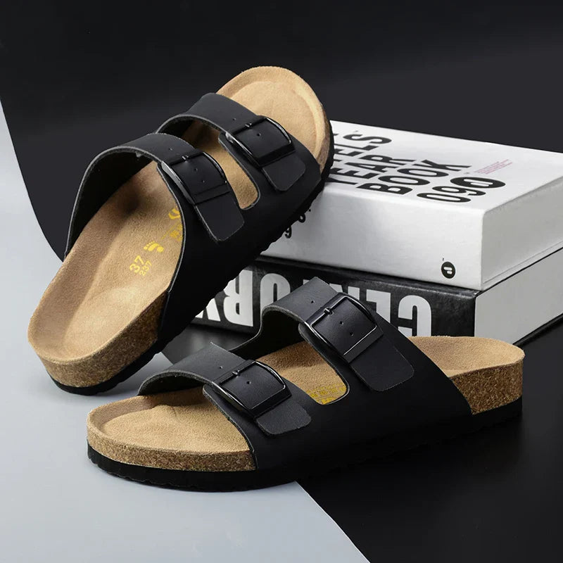 Men's double buckle cork footbed sandals for casual summer wear. Comfortable and adjustable slip-on slides.