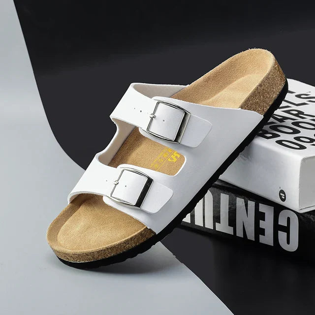Men's slip-on summer slides with double buckle design and supportive cork footbed for casual comfort.