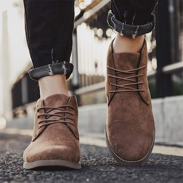 Men's practical lace-up ankle boots. Durable support and slip-resistant sole for outdoor adventures.