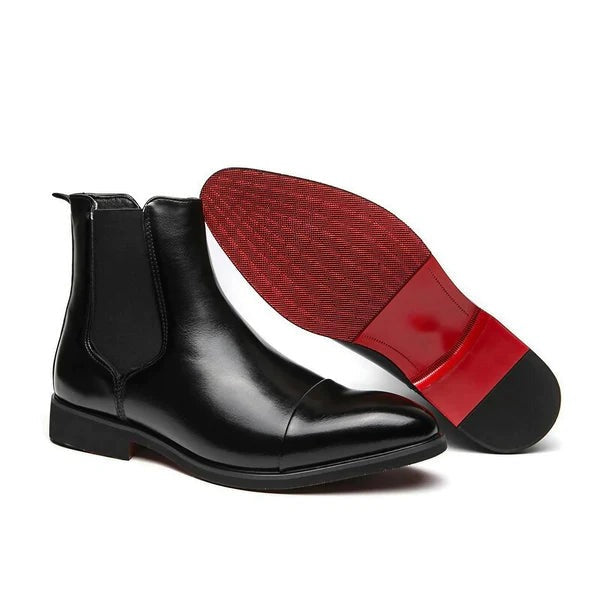 Close-up: Men's durable black boots, showcasing smart casual style & comfort. Quality everyday walking footwear.