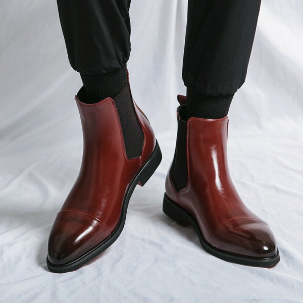 Pair of men's durable & stylish black boots. Comfortable smart casual everyday footwear for various outfits.
