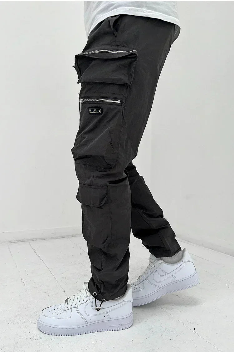 Men's durable cargo pants with multiple utility pockets, comfortable fit, ideal for outdoor wear & everyday style.