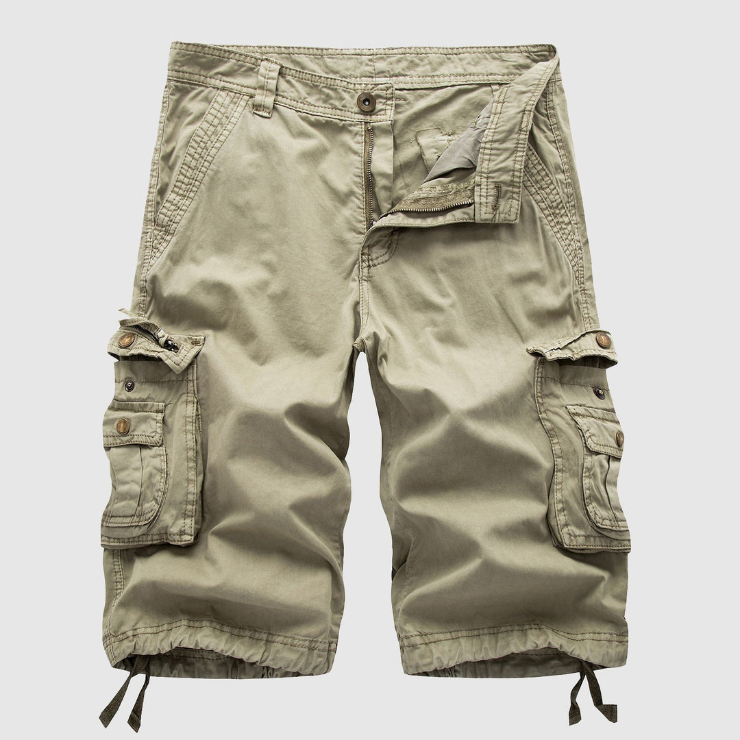 Men's durable cargo shorts, knee-length for casual explorer style, multi-pocket outdoor wear.
