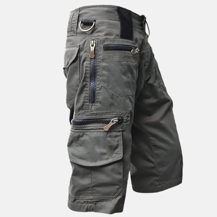 Stylish men's cargo shorts with visible side pockets and relaxed fit, designed for comfort and utility.