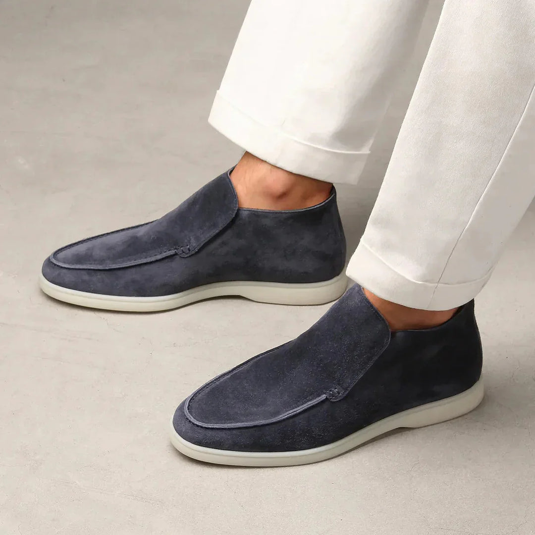 Comfortable men's moc toe slip-on shoes with minimalist design for easy wear.