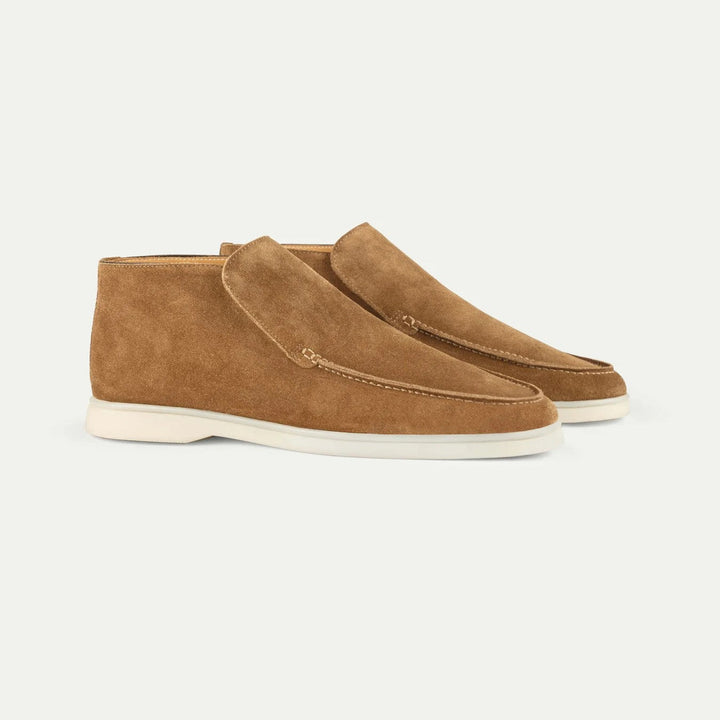 Men's casual slip-on shoes for all-day comfort; a fashionable, minimalist moc toe design.