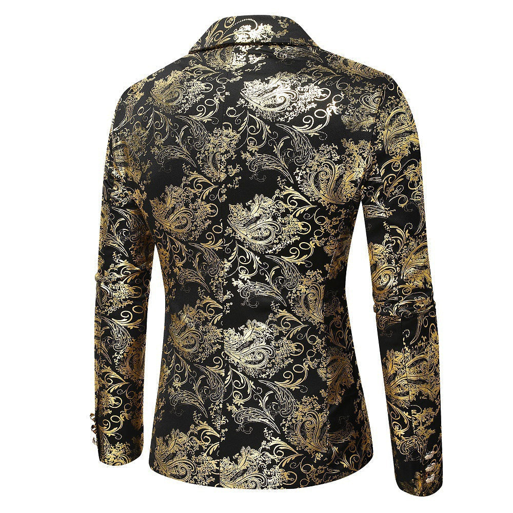 Detailed view of men's black blazer fabric showcasing the intricate elegant gold pattern design.