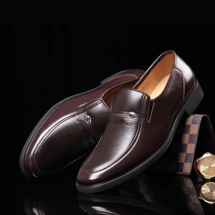 Men's elegant black formal loafers, perfect for professional office wear & sophisticated dress shoe style.