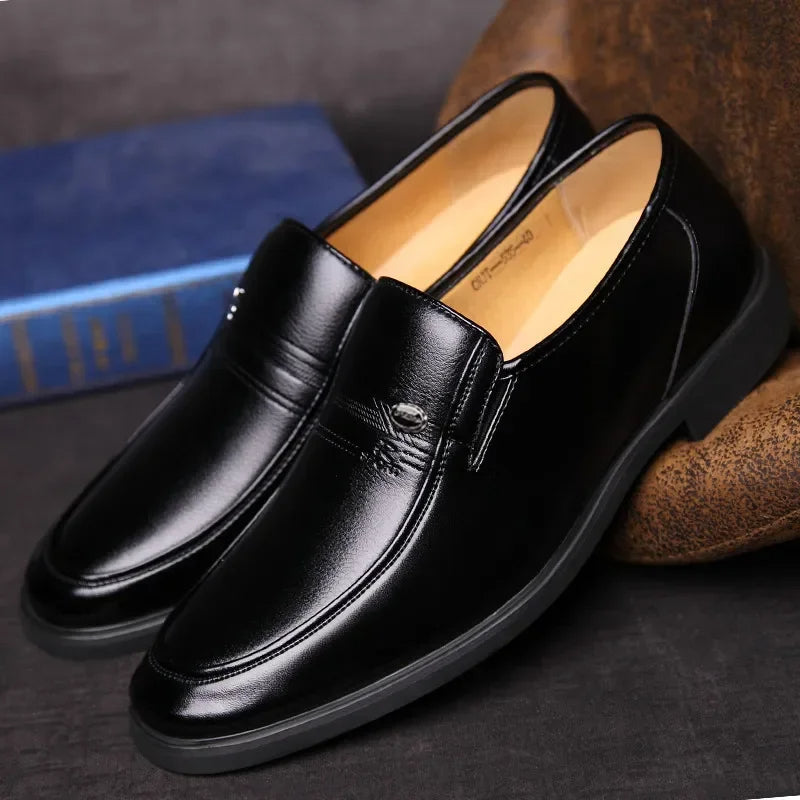 Sophisticated men's leather loafers, offering timeless elegance & comfort for professional and formal occasions.