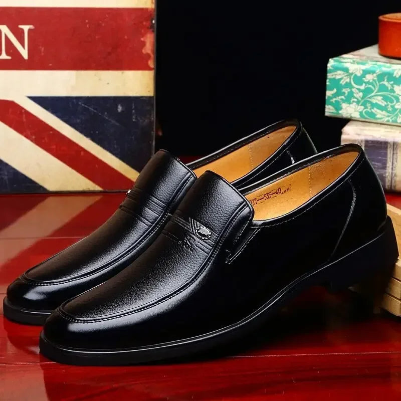 Modern men's formal loafers in a sleek design, ideal for professional business attire & elegant dress shoe style.