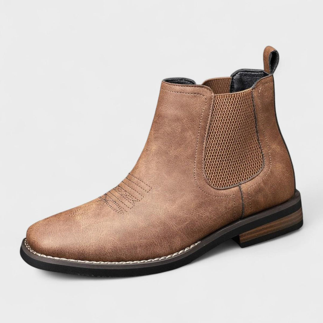 Men's elegant brown leather Chelsea boots with modern square toe & comfortable pull-on design.
