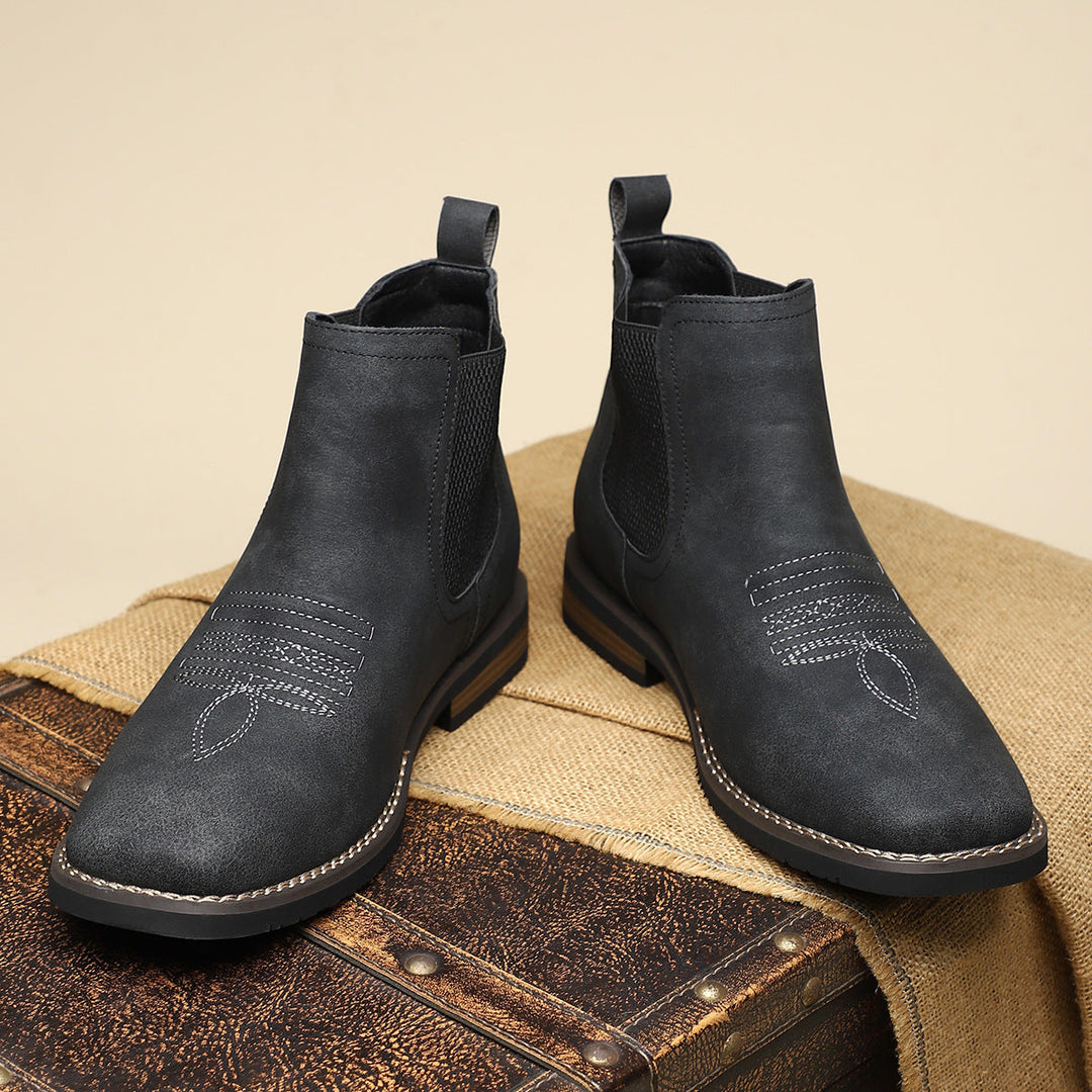 Comfortable men's pull-on Chelsea boots in black, blending modern style with everyday wearability.