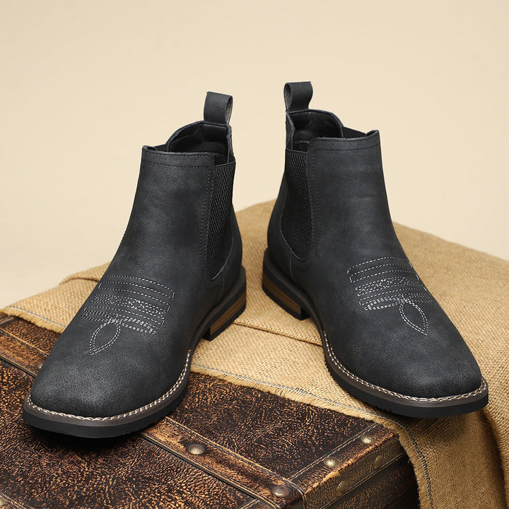 Comfortable men's pull-on Chelsea boots in black, blending modern style with everyday wearability.