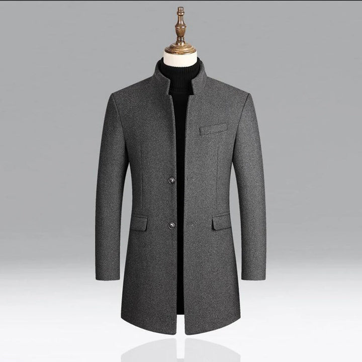 Back view of a men's classic tailored overcoat, emphasizing its elegant long cut and formal outerwear silhouette.