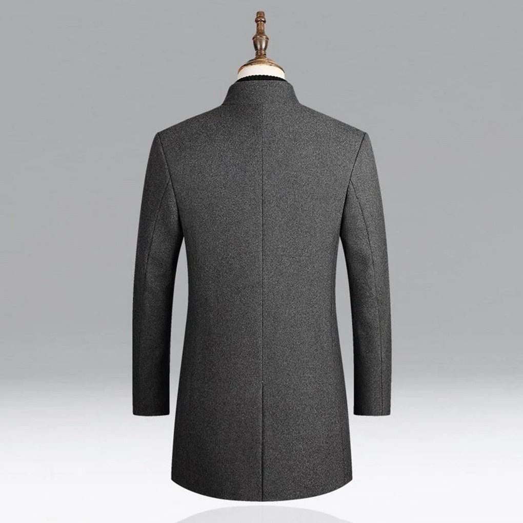 Men's elegant formal overcoat paired with a scarf, demonstrating timeless winter style for business outerwear.
