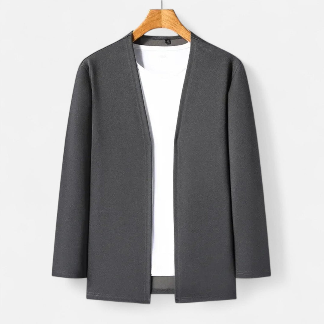 Stylish men's long-sleeve cardigan cloak, a refined layering piece for elegant casual chic looks.