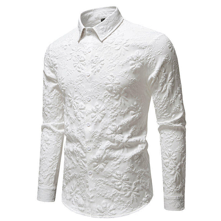 Close-up of the detailed floral embroidery on a men's stylish long sleeve shirt, showcasing unique design.
