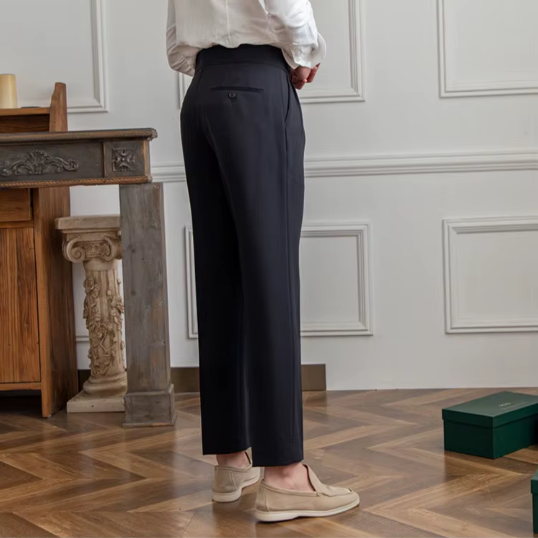 Men's black pleated dress pants, a timeless tailored fit for business and smart events.