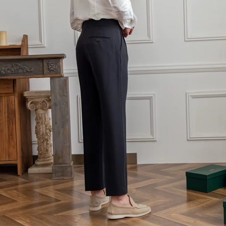 Men's black pleated dress pants, a timeless tailored fit for business and smart events.