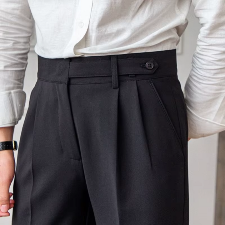 Versatile beige men's pleated chinos, perfect for a refined business casual wardrobe.
