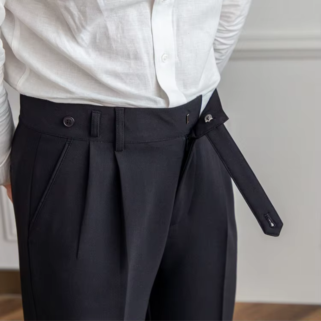 Men's camel classic pleated chinos, excellent for a sleek, polished business casual ensemble.