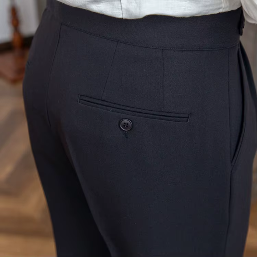 Elegant black men's pleated trousers, a must-have for a sharp, tailored formal outfit.