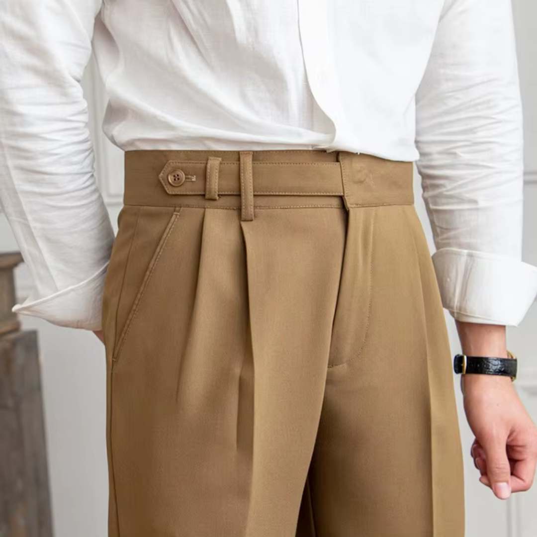 Camel pleated men's chino pants, offering a refined look for both work and leisure.