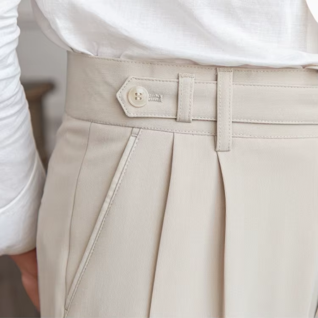 Stylish men's beige pleated trousers, a tailored fit for comfortable business casual attire.