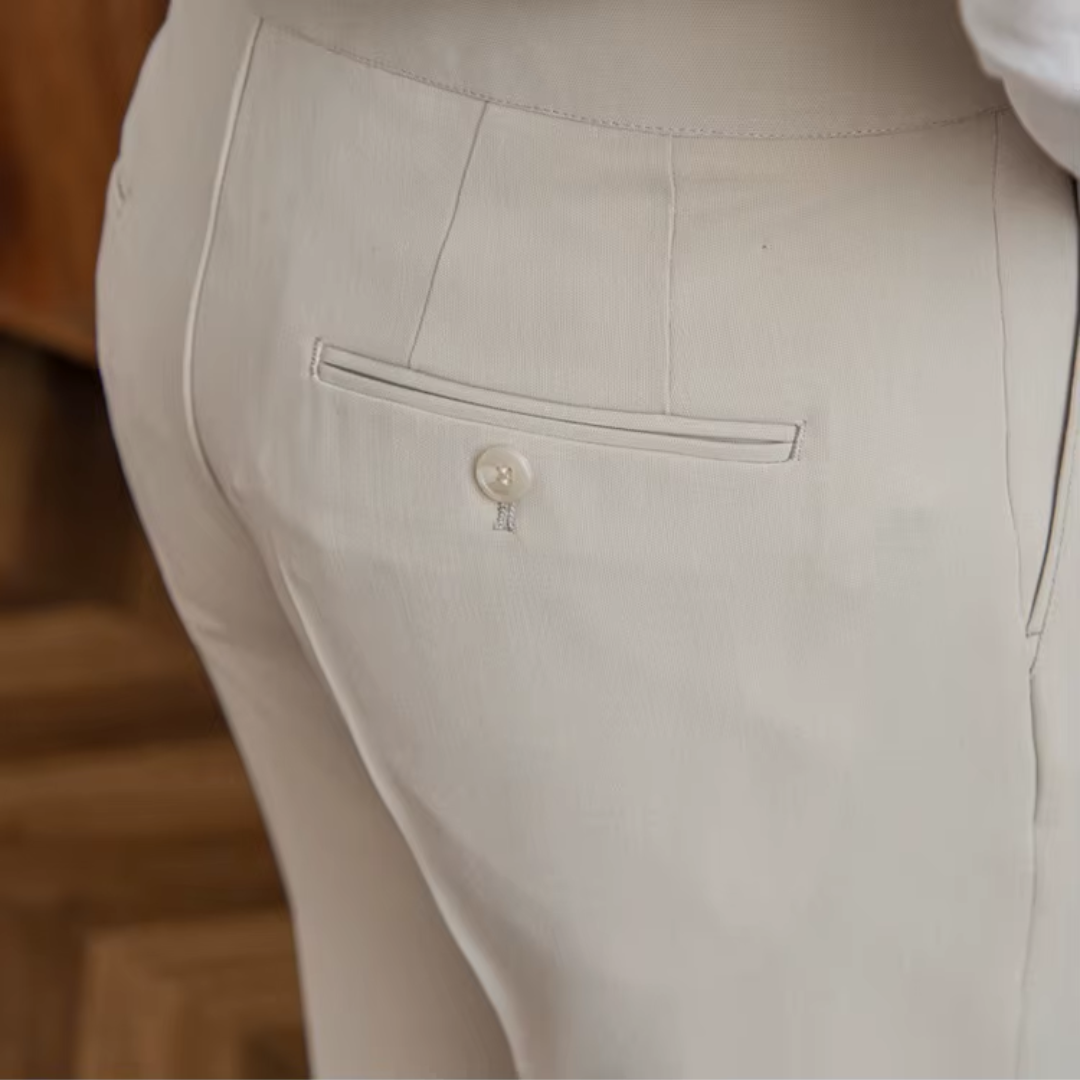 Men's camel pleated chinos, offering a classic style for versatile business to casual outfits.