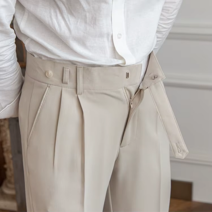 Formal men's black pleated trousers, suitable for elegant office wear or special occasions.