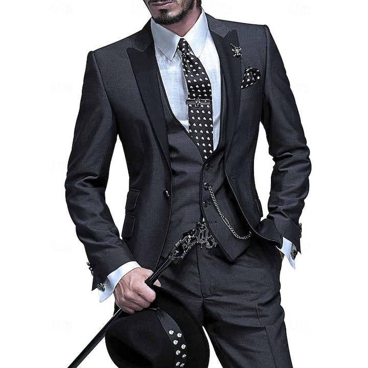 Fashionable men's three-piece suit set, featuring a sharp blazer, waistcoat, and slim-fit trousers.