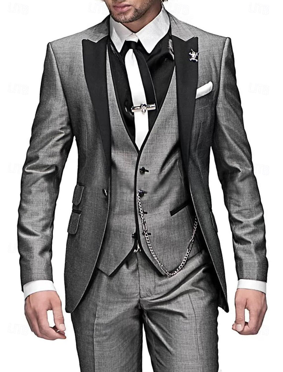 Sophisticated men's three-piece suit set: a crisp blazer, fitted vest, and trousers for polished menswear.