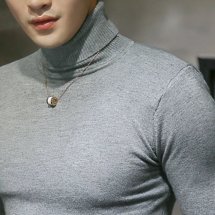 Elegant men's knit turtleneck sweater for winter warmth and style.