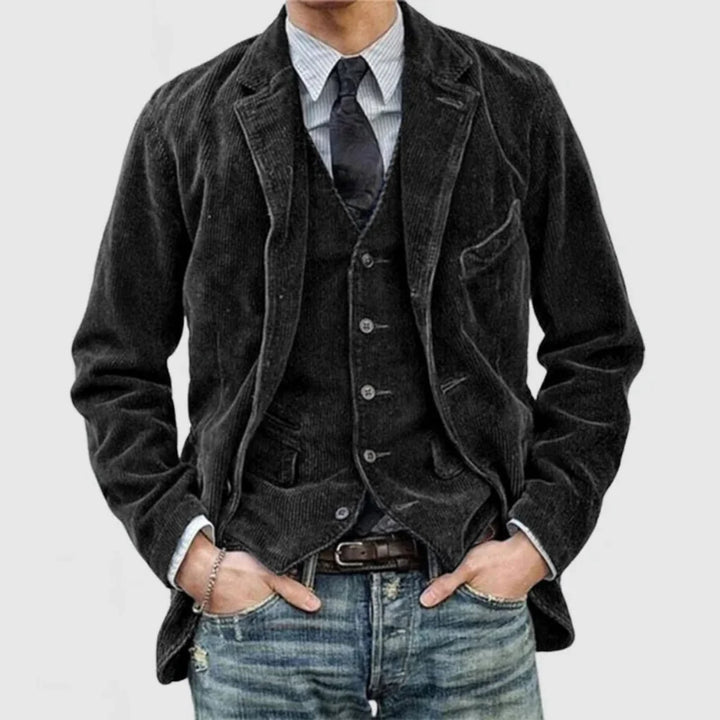 Stylish two-piece men's vintage suit set featuring a classic blazer and vest.
