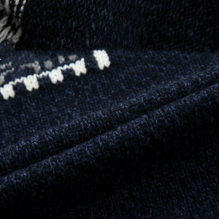Cozy men's full zip Fair Isle jacket with a distinctive snowflake pattern and stand collar for winter comfort.