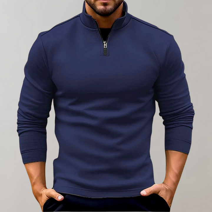 Close-up of a men's fitted knit half zip jumper, showing soft texture and long sleeves. Winter fashion essential.