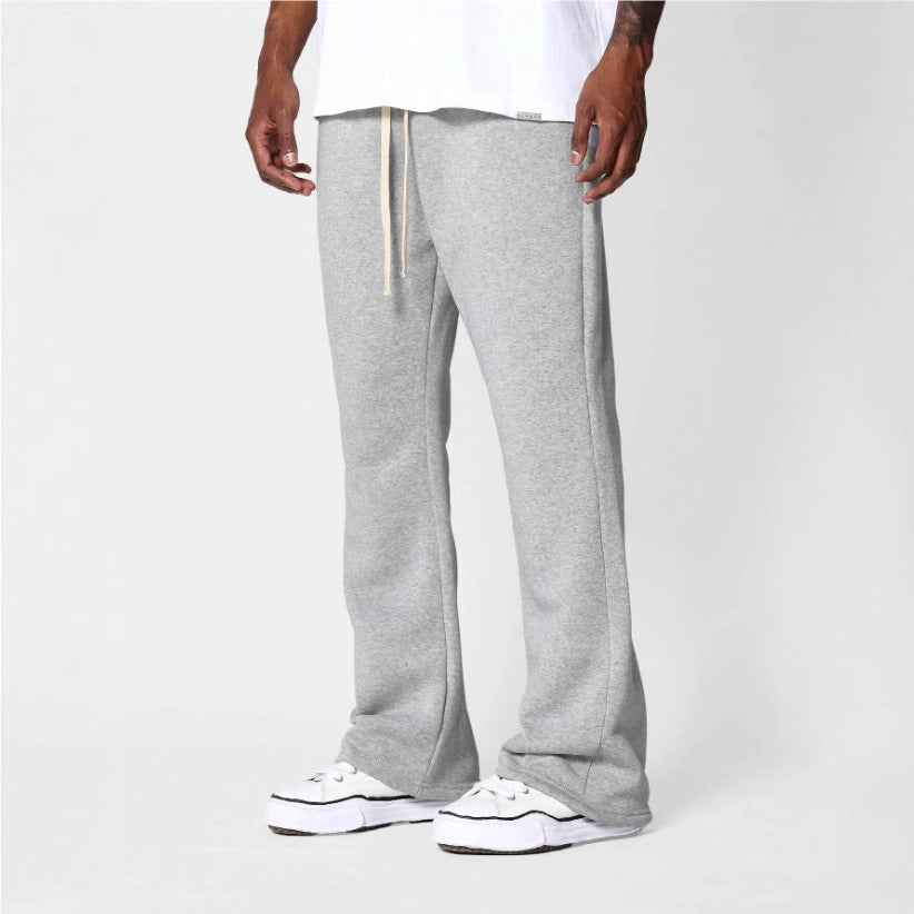 Men's flared sweatpants in a relaxed fit, perfect for ultimate comfort & stylish everyday athleisure wear.