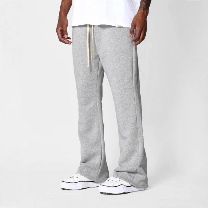 Men's flared sweatpants in a relaxed fit, perfect for ultimate comfort & stylish everyday athleisure wear.